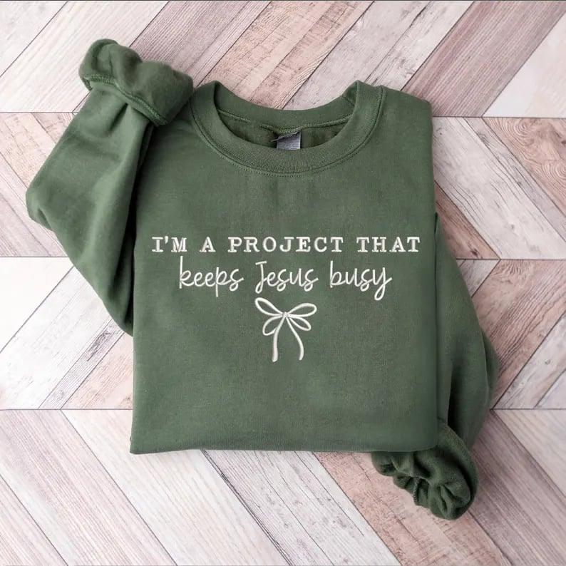 I'm a Project That Keeps Jesus Busy Embroidered Christian Shirt | Custom Thread Color